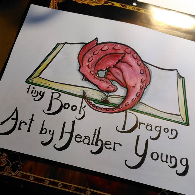 More finished I think. Pretty happy with. Can't do more till home tomorrow. Working on a commissioned bearded dragon drawing next.#logo #Watercolor #ink #Dragon #sleep #book #bookdragon #art #artist #illustration #illustrator #kidlitartist​ #sleepy